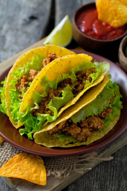 istock plate of tacos, nachos and tomato dip 914948384