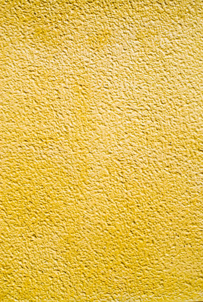 istock New orange plaster on  wall closeup 914948406
