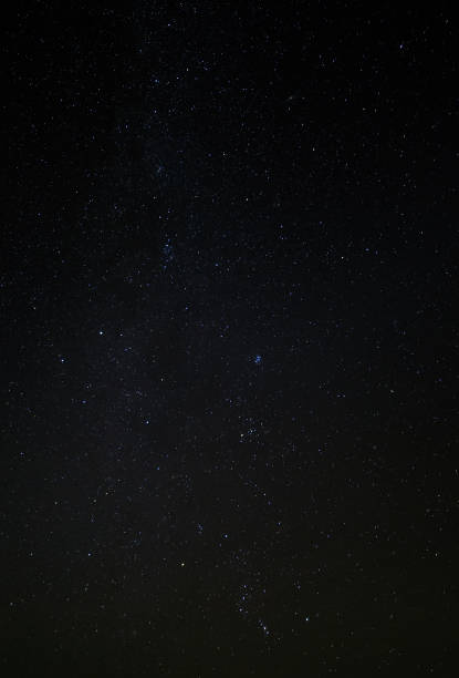 istock The night starry sky, a dark outer space with nebulae and constellations. 914951138