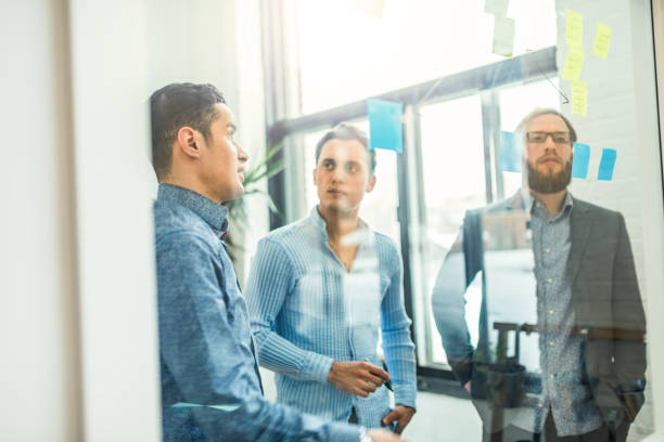 istock Young partners discussing business ideas 914952580