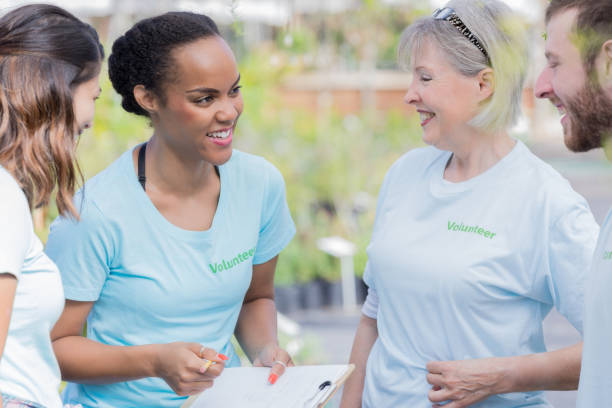 istock Group of diverse garden center volunteers 914953372