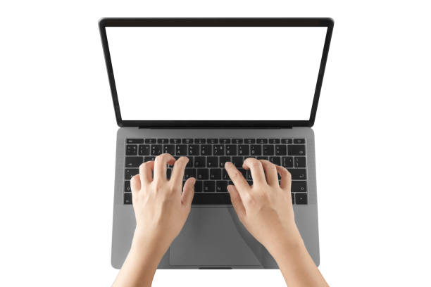 istock Women using laptop with blank screen at table in the office 914959596