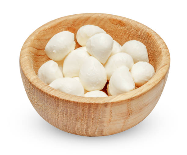 istock Mozzarella cheese in bowl on white background 914960798