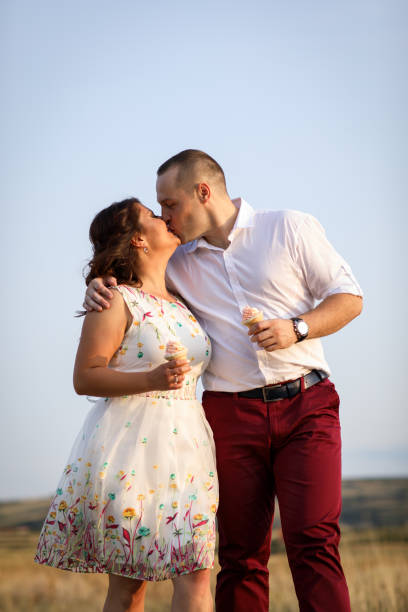 istock Couple kissing in nature 914962216