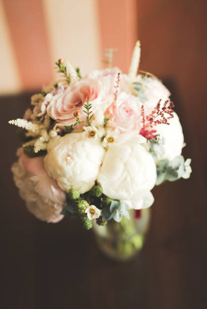 istock Beautiful wedding bouquet with different flowers, roses 914972952
