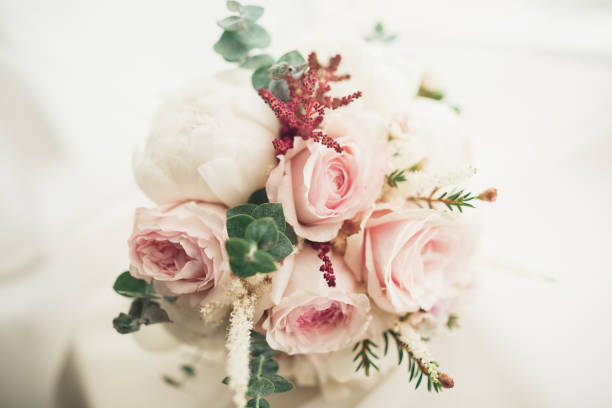 istock Wonderful luxury wedding bouquet of different flowers 914973042