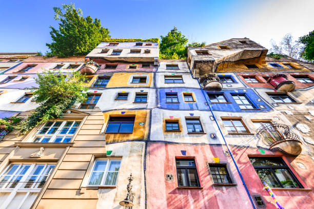 Vienna, Austria - Hundertwasserhaus Vienna, Austria - 2nd August 2015: A view of the outside of buildings in Hundertwasserhaus, expressionist landmark in Vienna during the day. hundertwasser house stock pictures, royalty-free photos & images