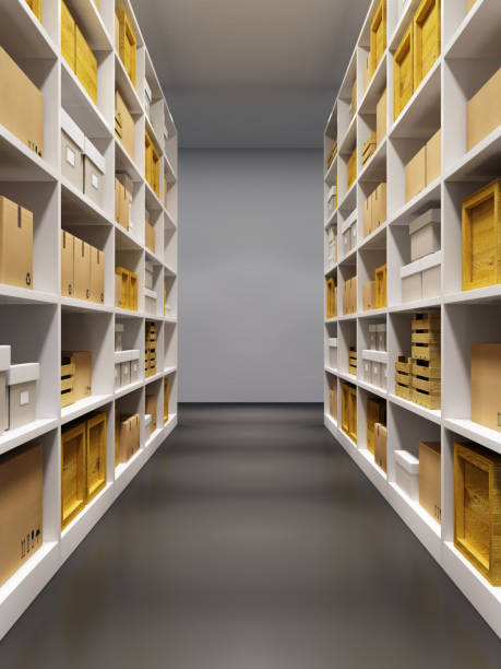 istock warehouse interior with rows of shelves with boxes 914986020