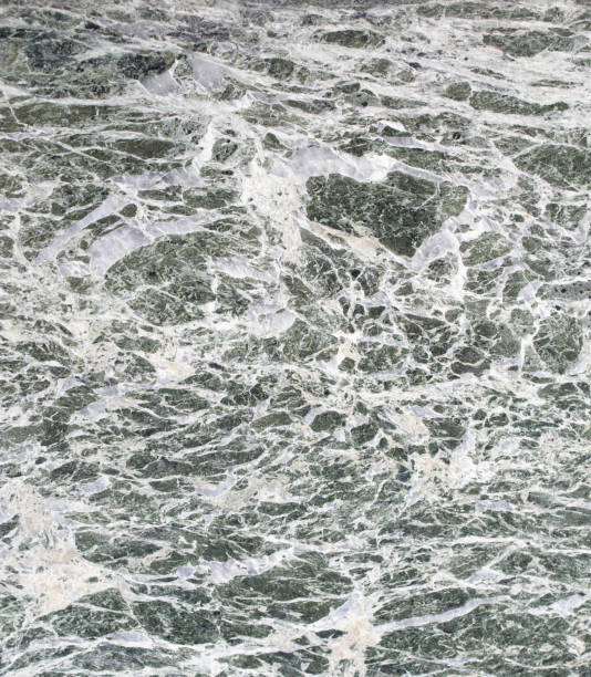 istock A polished green marble with vein closeup 914989932