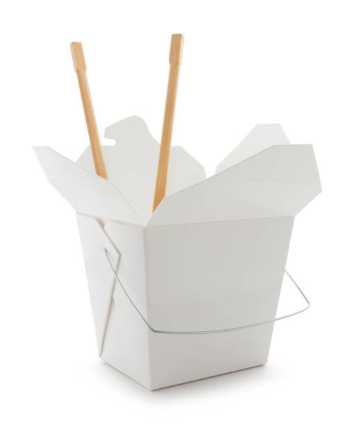 Asian Food Box with Chopsticks Asian take out food box with bamboo chopsticks isolated on white (excluding the shadow) chinese takeout stock pictures, royalty-free photos & images