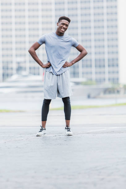 istock Young African-American man in workout clothing 914993958