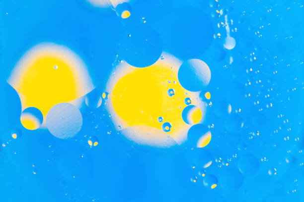 istock mixing water and oil, beautiful color abstract background based on circles and ovals, macro abstraction 914994928