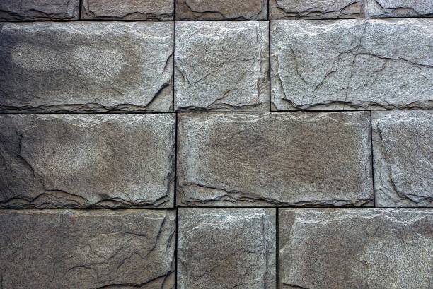 istock Gray wall of a brick house 914998724