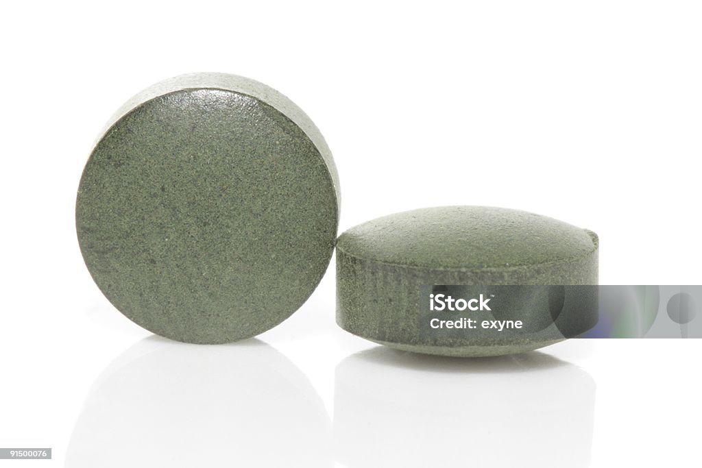 Duas green espirulina tablets - Foto de stock de Alga royalty-free