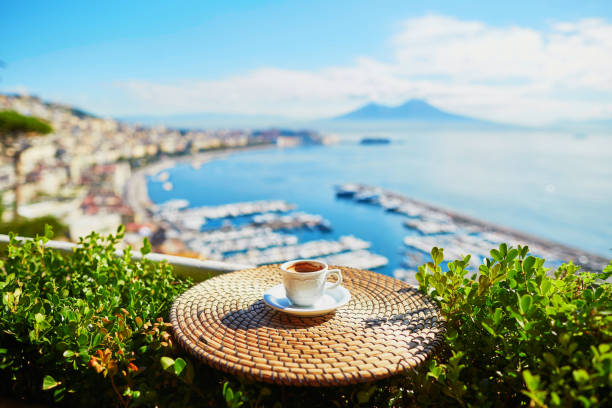 istock Cup of coffee with view on Vesuvius mount in Naples 915001280