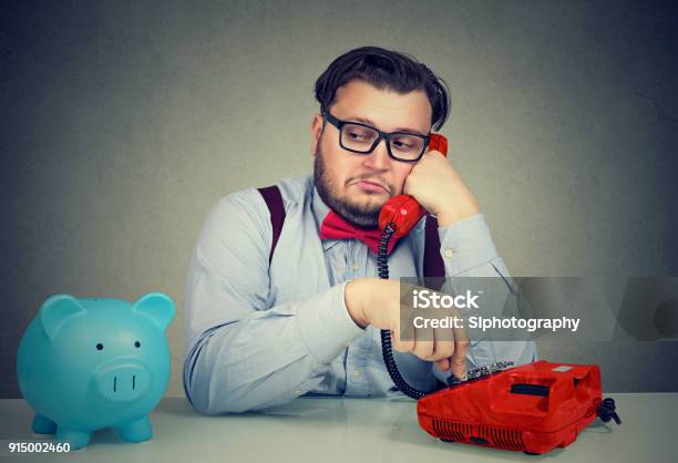 Bank Worker Having Phone Call Stock Photo - Download Image Now - Collection, Debt, Using Phone