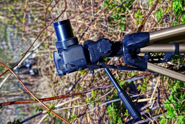 istock Black camera on a tripod standing on the street 915005134