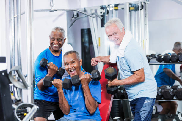 istock Three senior multi-ethnic men working out at gym 915005294