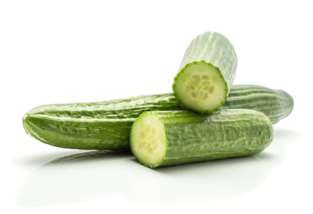 istock Hothouse cucumber isolated on white 915010330