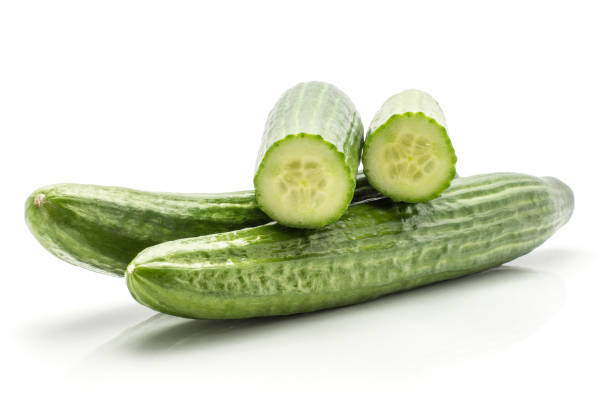 istock Hothouse cucumber isolated on white 915010338