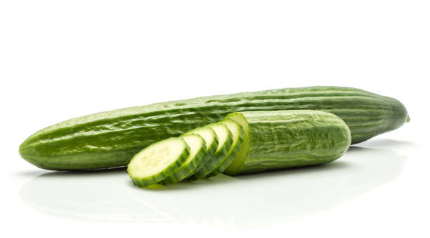 istock Hothouse cucumber isolated on white 915010454