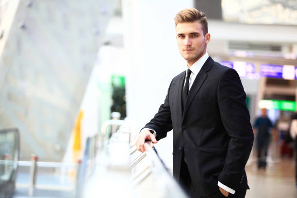 istock Handsome smiling confident businessman portrait 915012946