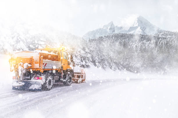 istock Snowplow cleared the snow-covered icy road 915016720