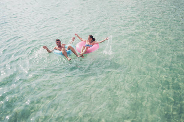 istock Senior couple enjoy sea water 915016890