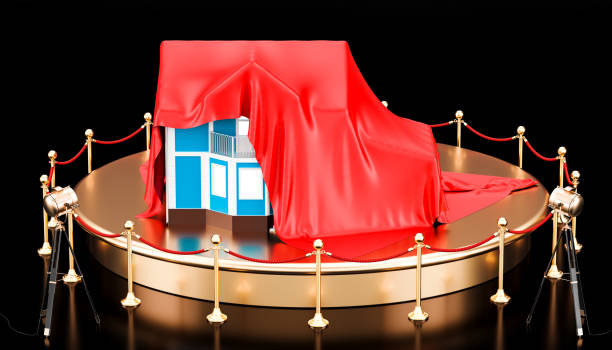 istock Podium with house covered red cloth. 3D rendering isolated on black background 915017146