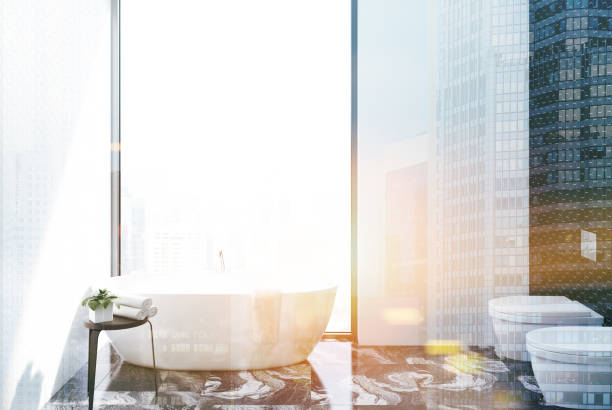 istock White tiled bathroom and toilet toned 915018676