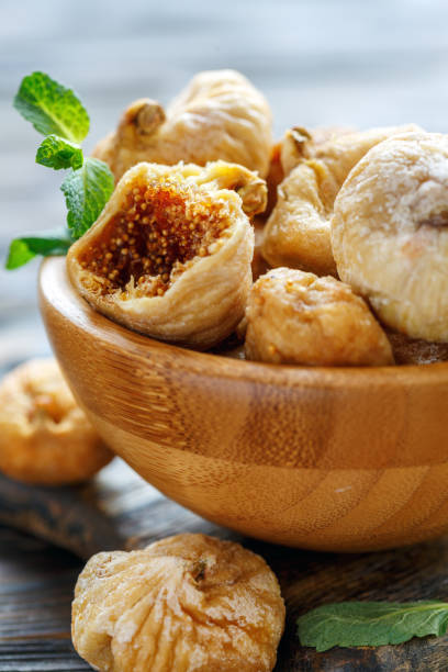 istock Dried figs in a bowl closeup. 915018970