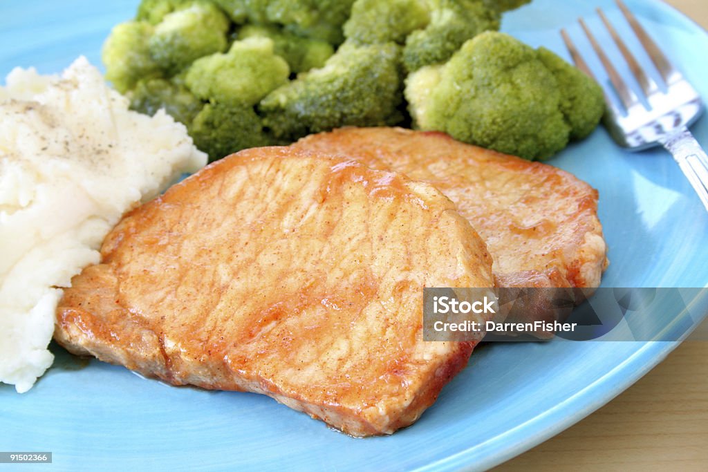 Chuletas de cerdo - Foto de stock de Al horno libre de derechos