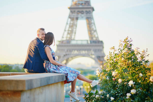 istock Romantic couple near the Eiffel tower in Paris 915024670