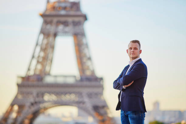 istock Handsome young man near the Eiffel tower 915028638