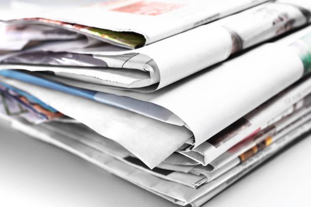 istock Pile of old folded newspapers 915032562