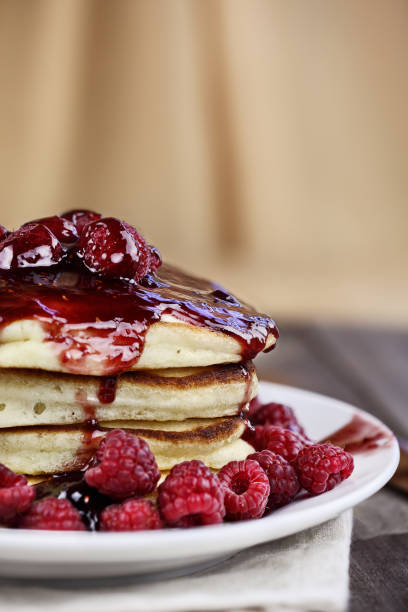 istock Pancakes with Fresh Rasperries and Raspberry Sauce 915041488