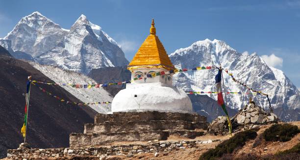 istock Stupa near Dingboche village with prayer flags 915042338