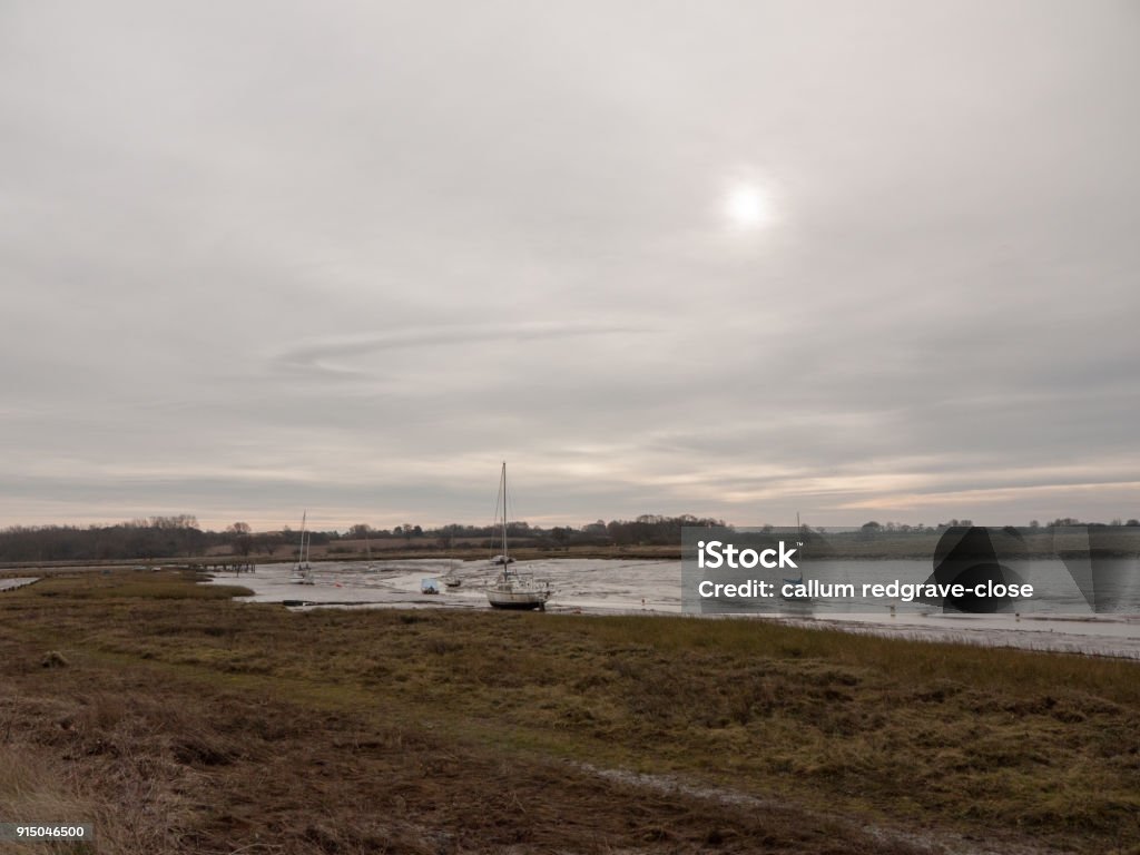 autumn winter dark cloudy overcast harbour scene estuary autumn winter dark cloudy overcast harbour scene estuary; essex; england; uk Backgrounds Stock Photo