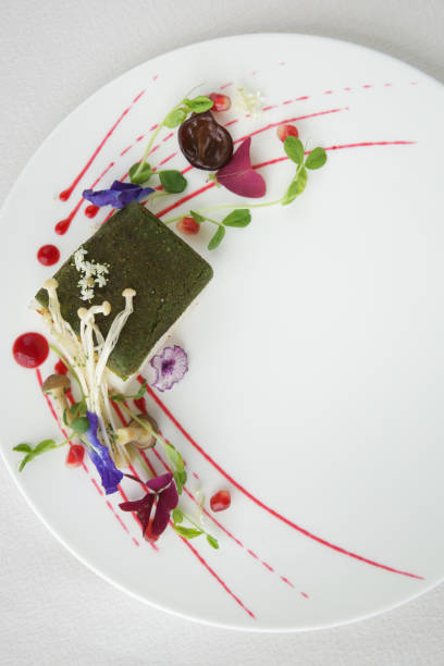 istock Fancy modern dessert decorated with eatable flowers 915046564