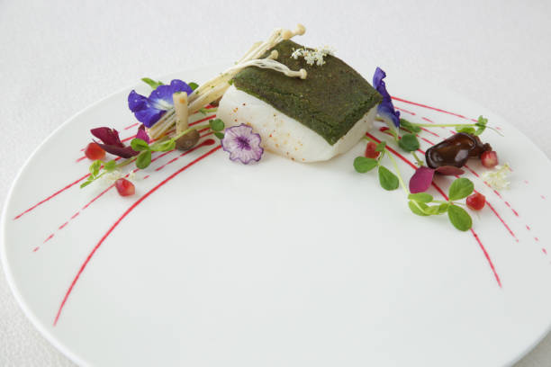 istock Fancy modern dessert decorated with eatable flowers 915049164