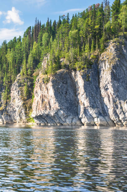 istock Virgin Komi forests, scenic cliffs on the taiga river Shchugor. 915052412