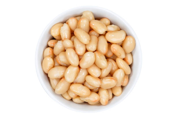 istock White beans from above bowl isolated on white 915053266