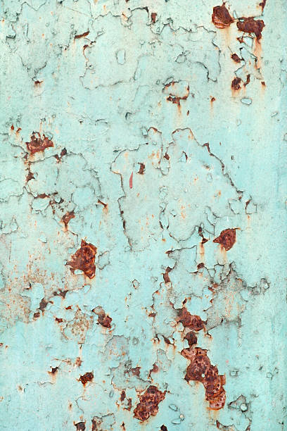 rusty metal surface with old paint stock photo