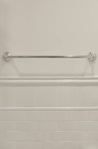 istock White Subway Tile Bathroom with Silver Towel Rack 915055714