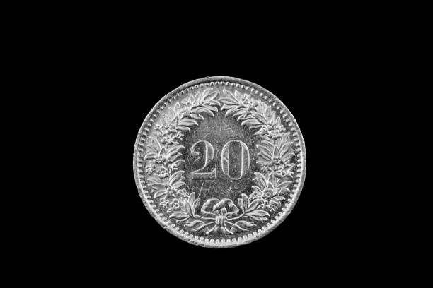 istock Swiss Twenty Centimes Coin Isolated On Black 915057006