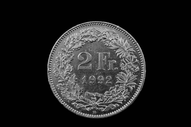 istock Swiss Two Franc Coin Isolated On A Black Background 915057008