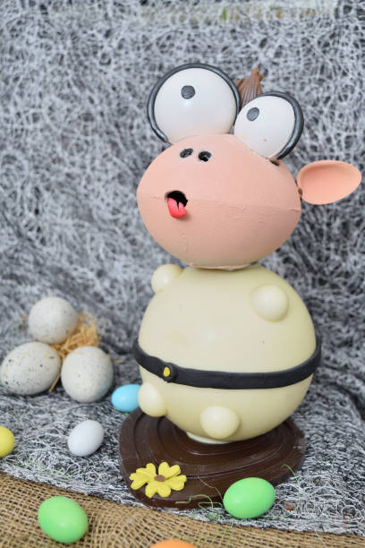 istock chocolate egg in the shape of a lamb with various decorations 915060656