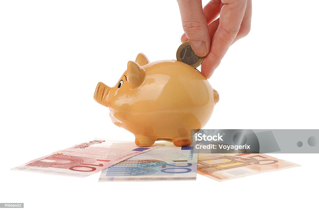 Свинья-копилка, рука и евро деньги - Стоковые фото Без людей роялти-фри