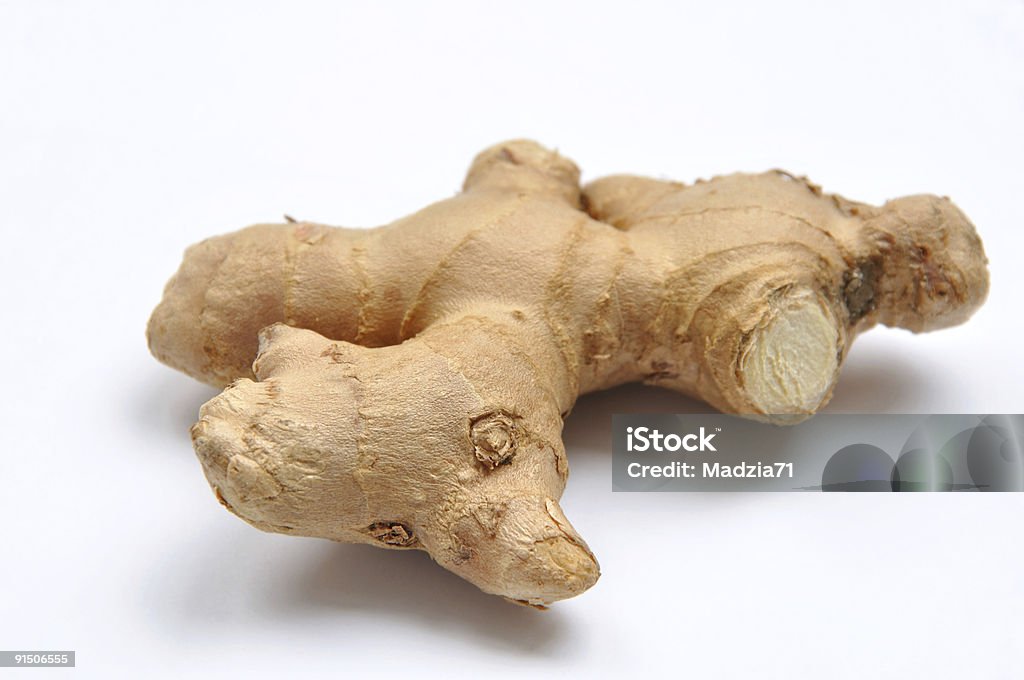 Close-up of ginger also known as zingiber Ginger on white background Ginger - Spice Stock Photo