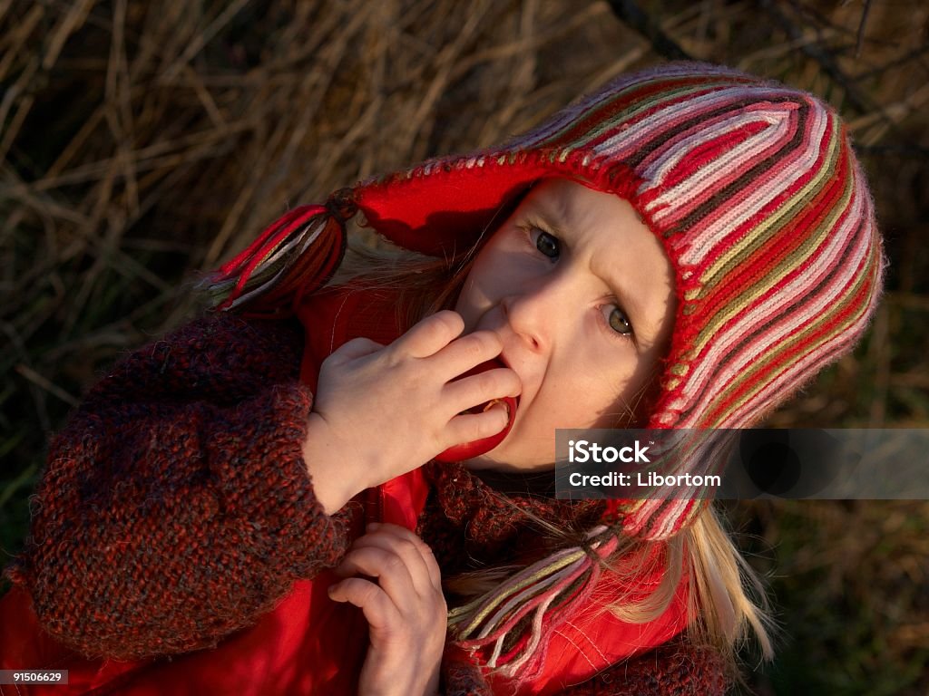 Girl eating apple  Agriculture Stock Photo